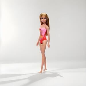Barbie Beach Doll with Pink Graphic One-Piece Swimsuit
